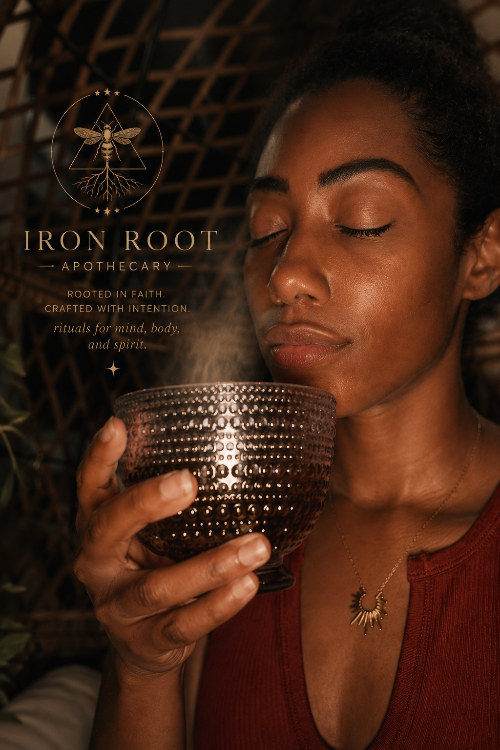 Iron Root Apothecary founder holding a warm ritual cup